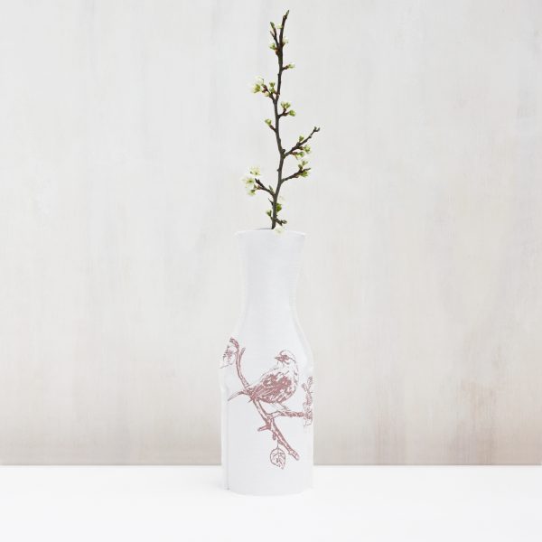 Frohstoff Flaschenhusse mit Spatz-Motiv in Rose mit einem Ast mit Blüten dran