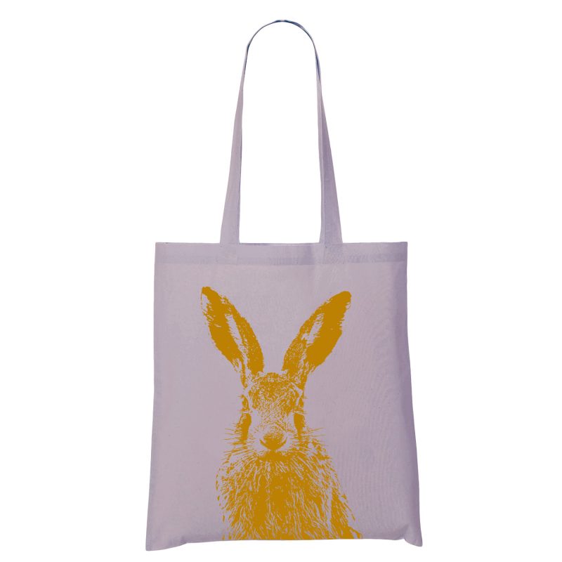 Frohstoff Stoffbeutel in der Farbe Flieder mit dem Motiv Feldhase in sattem honiggelb
